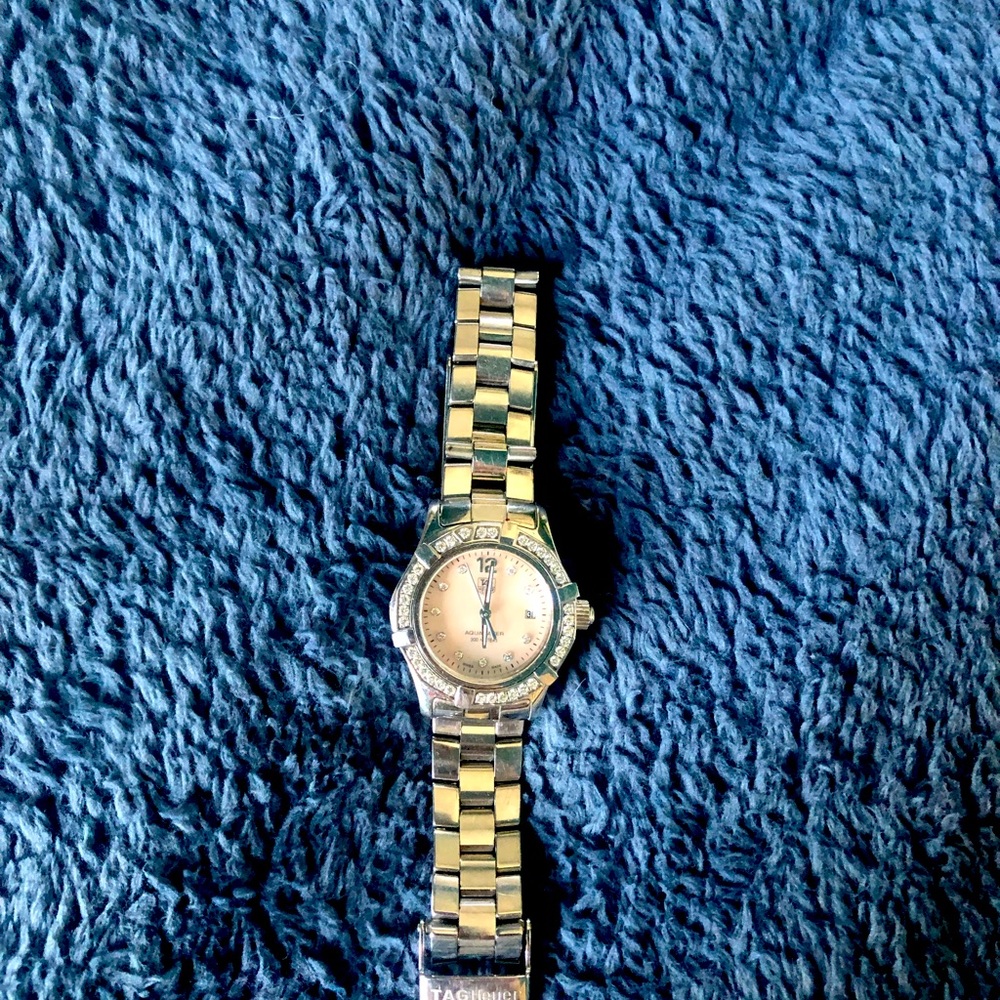 Beautiful Tag Heuer Aquaracer, pink face set with diamonds.